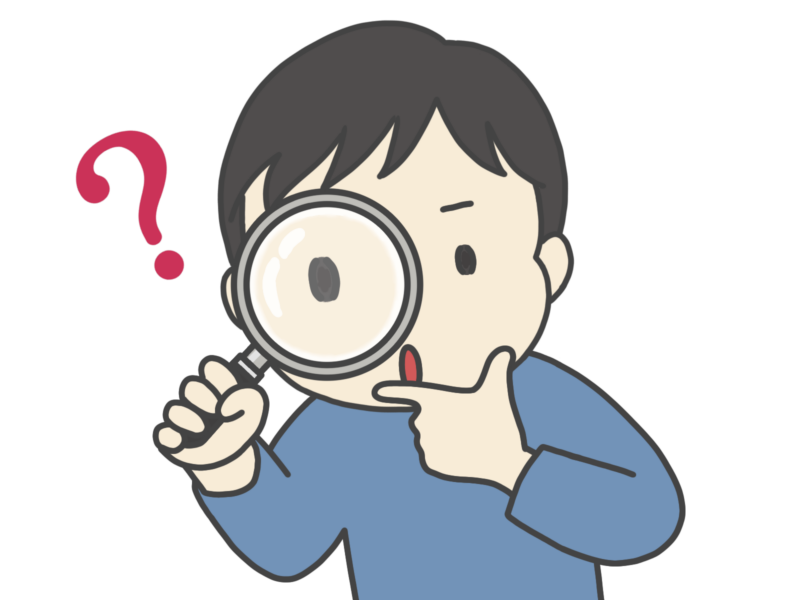 積みプラの中に劣化している箇所はないか虫眼鏡で調べる男性